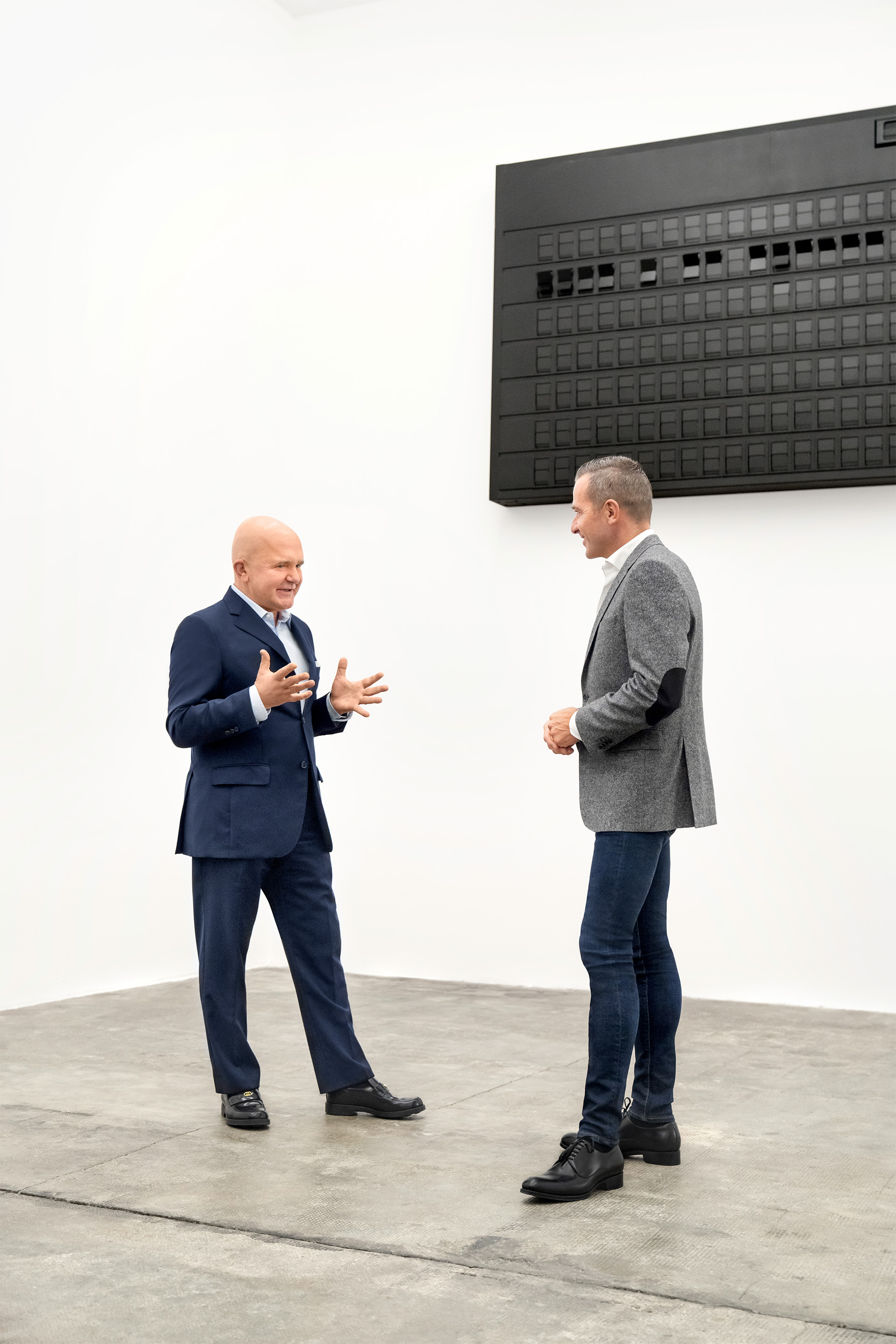 Henrik Wenders (till höger), Head of Brand på Audi AG, i samtal med Christian Boros. 